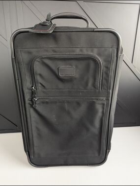 Tumi Black Men’s Carry-On Rolling Travel Bag